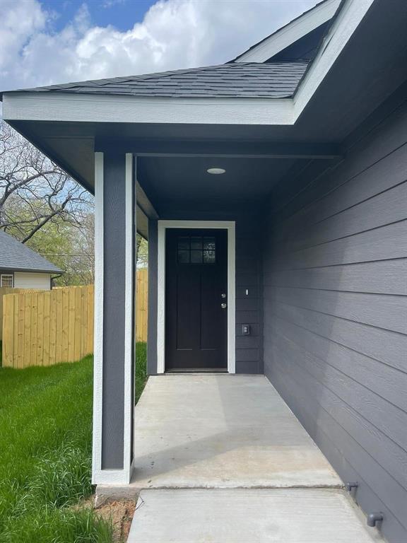 1315 West Gandy Street Denison, TX 75020 - Photo 2 of 19 a view of entrance door of the house