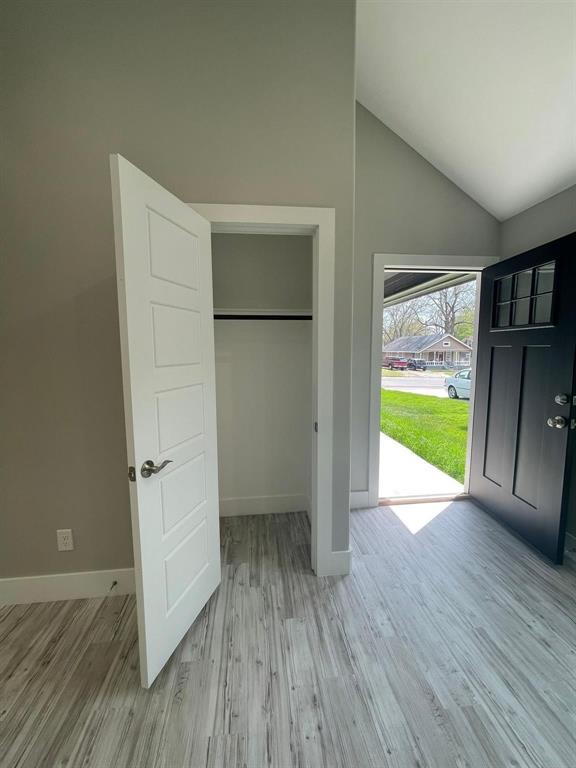 1315 West Gandy Street Denison, TX 75020 - Photo 4 of 19 a view of empty room with wooden floor and fan