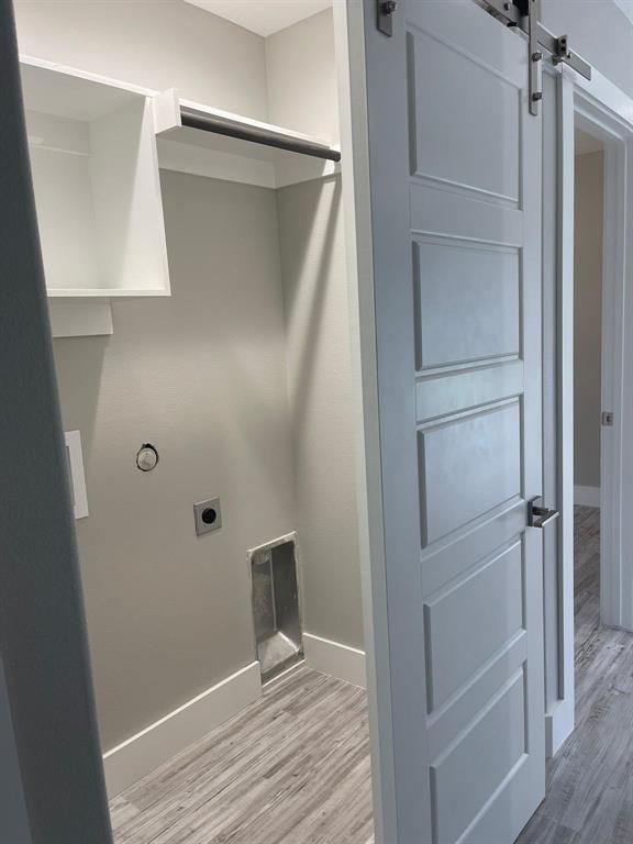 1315 West Gandy Street Denison, TX 75020 - Photo 10 of 19 a view of an empty walk in closet