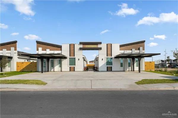 a view of a house with basketball court