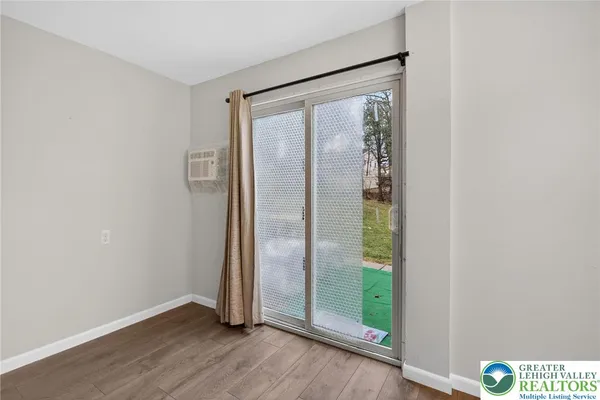 a kitchen with a stove a sink and a refrigerator