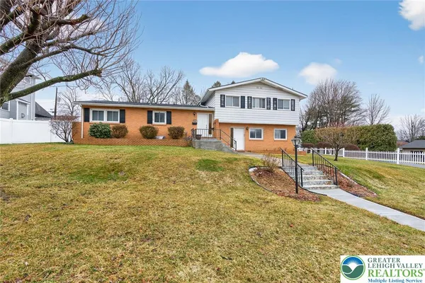 a house view with a outdoor space