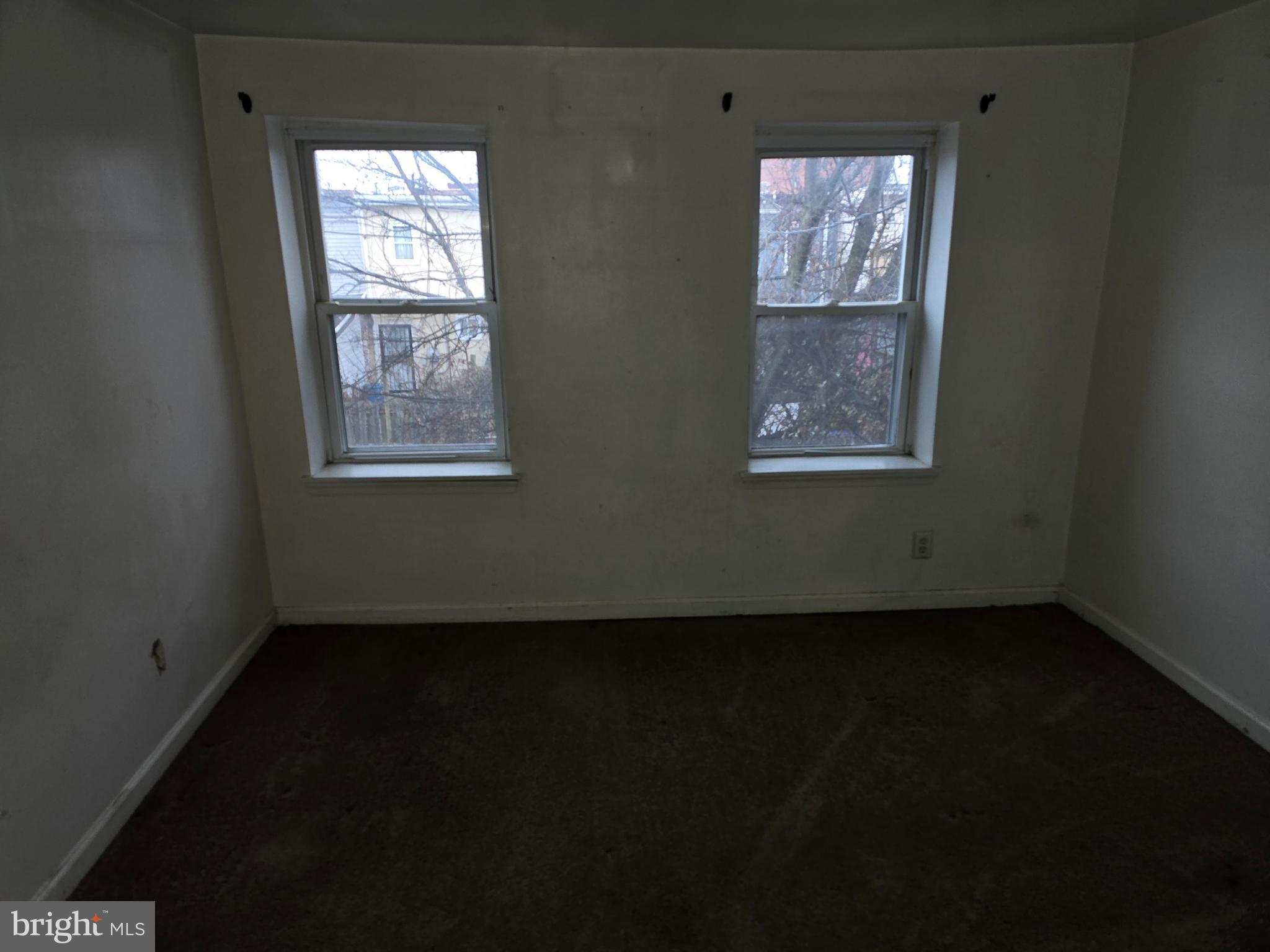 1121 Cleveland Street Baltimore, MD 21230 - Photo 11 of 13 a view of an empty room and window