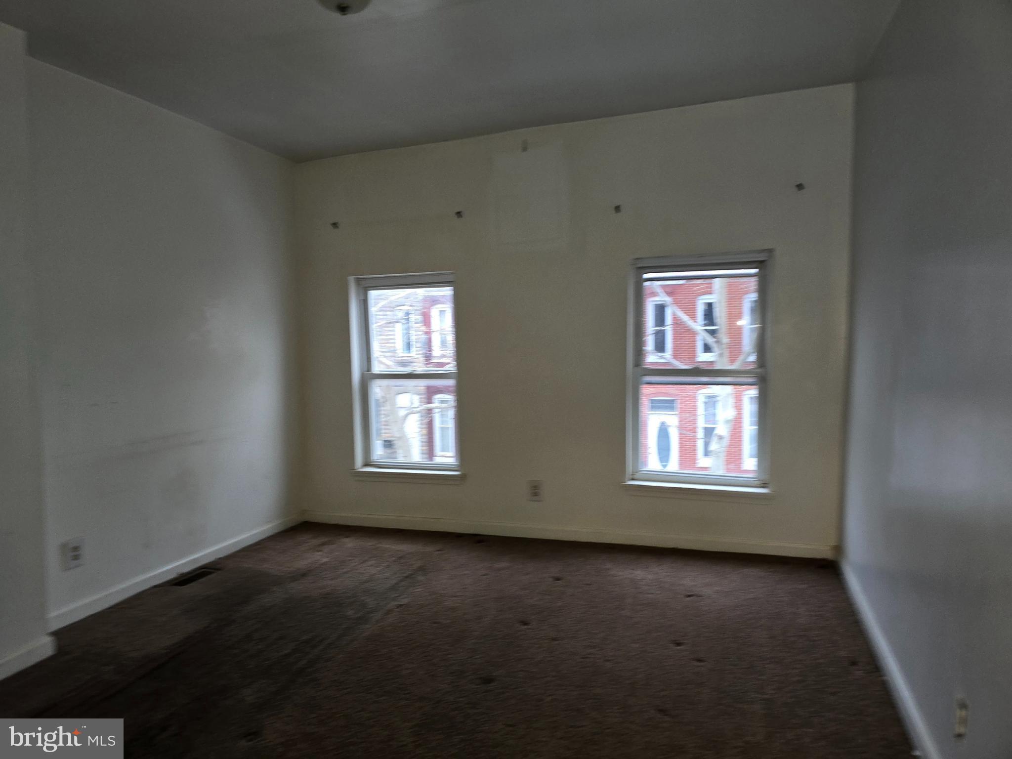 1121 Cleveland Street Baltimore, MD 21230 - Photo 12 of 13 an empty room with a window