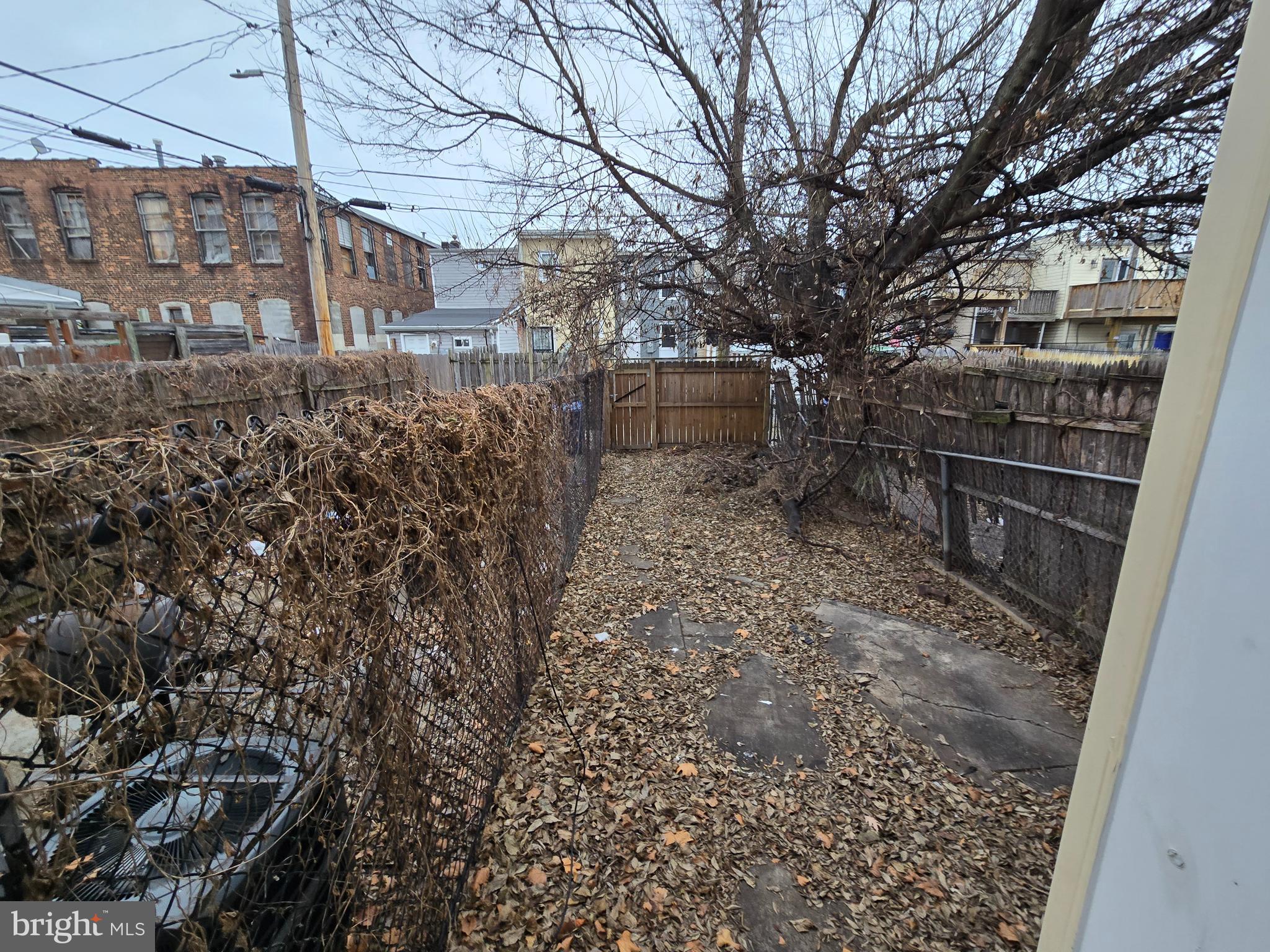 1121 Cleveland Street Baltimore, MD 21230 - Photo 8 of 13 a backyard of a house with lots of green space