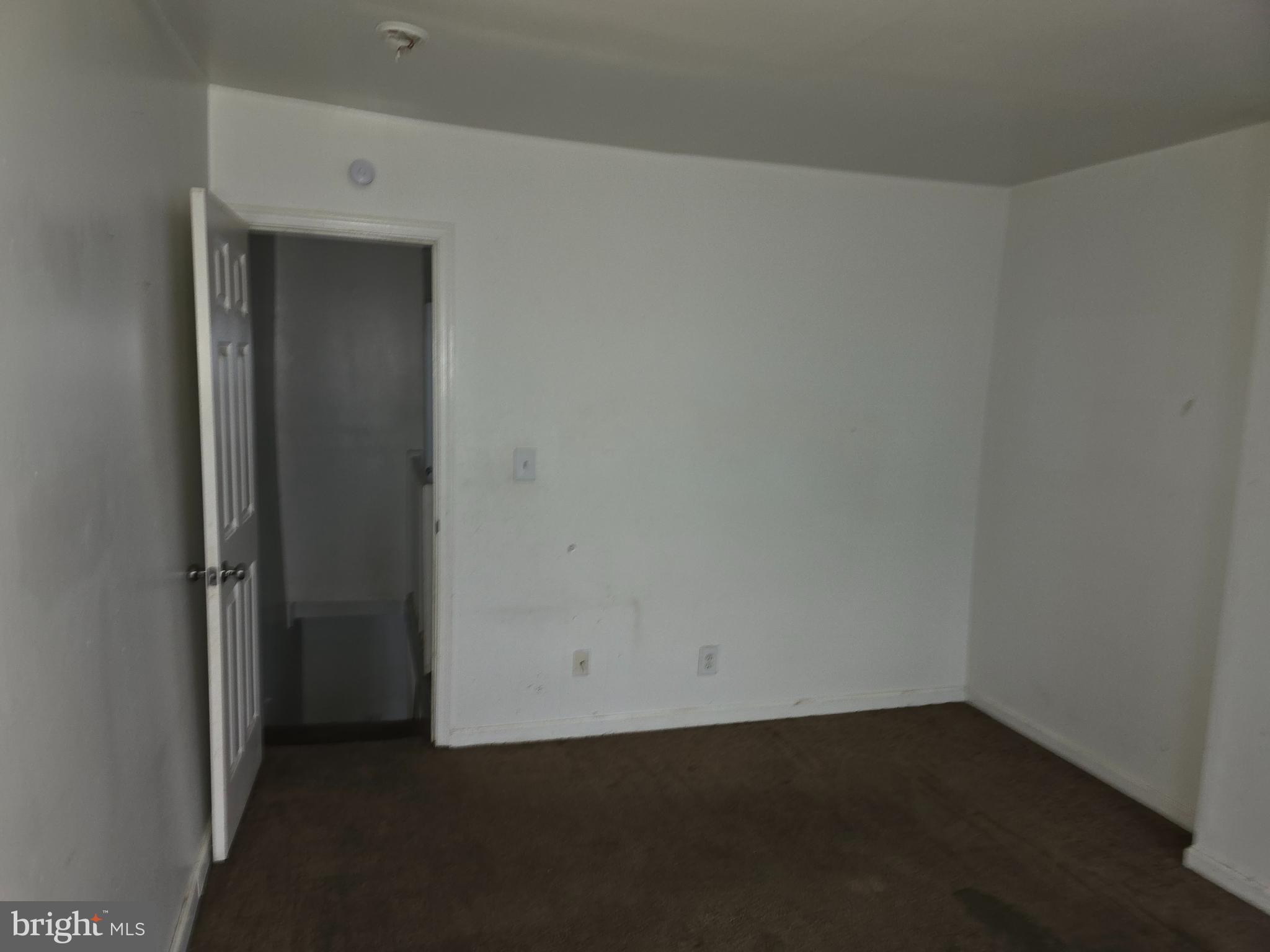 1121 Cleveland Street Baltimore, MD 21230 - Photo 9 of 13 an empty room with a gallery