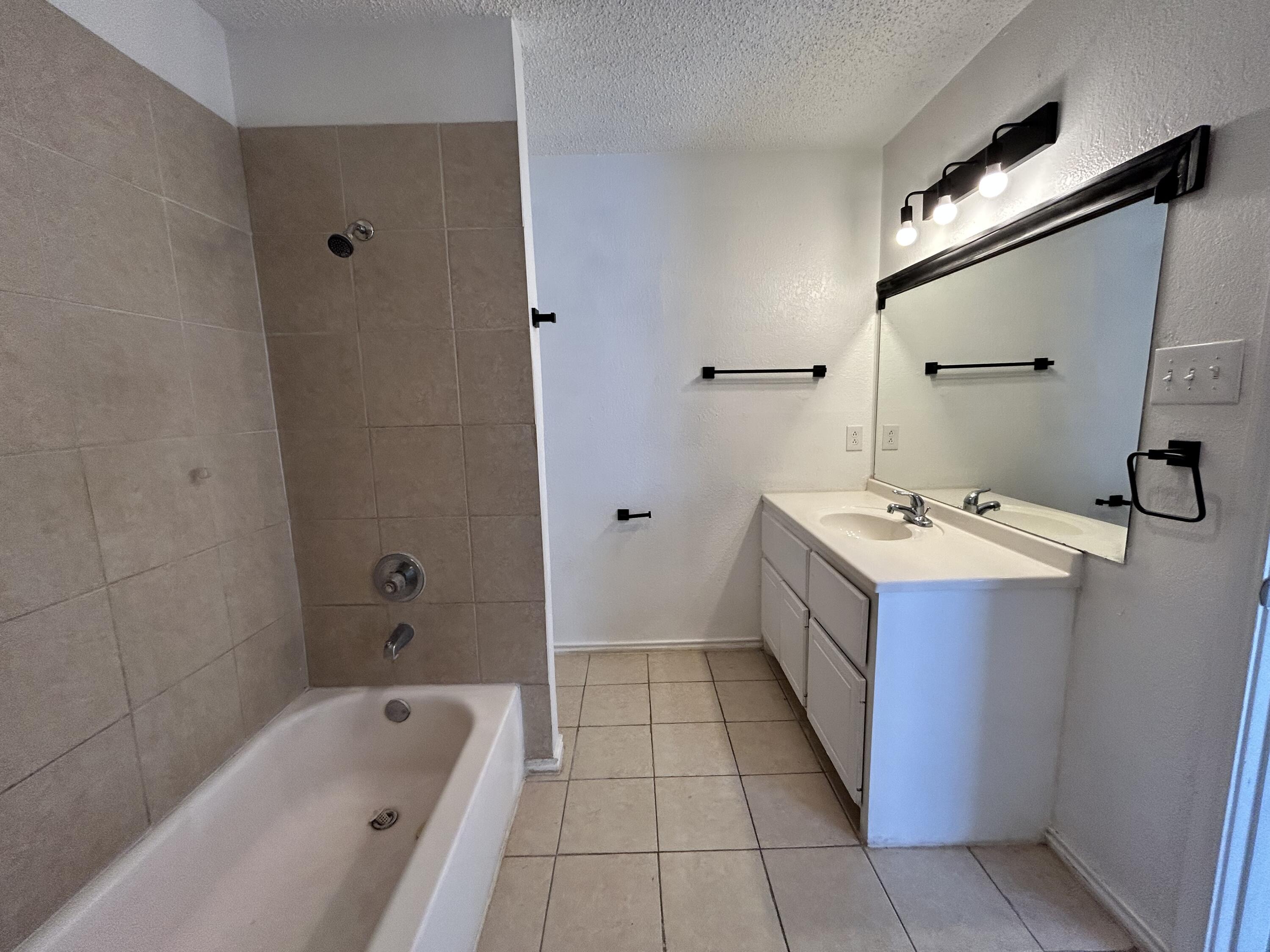 1303 80th Street, Unit A Lubbock, TX 79423 - Photo 8 of 16 IMG_0232