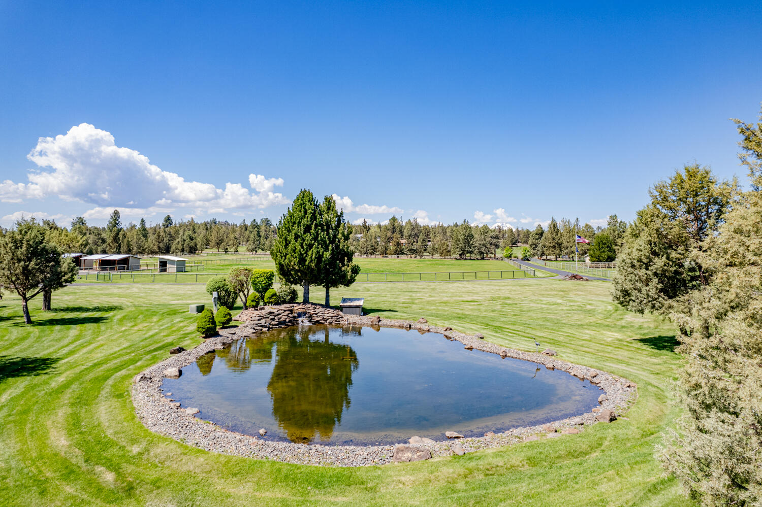 66250 Gerking Market Road Bend, OR 97703 - Photo 74 of 86 a view of a swimming pool with a yard