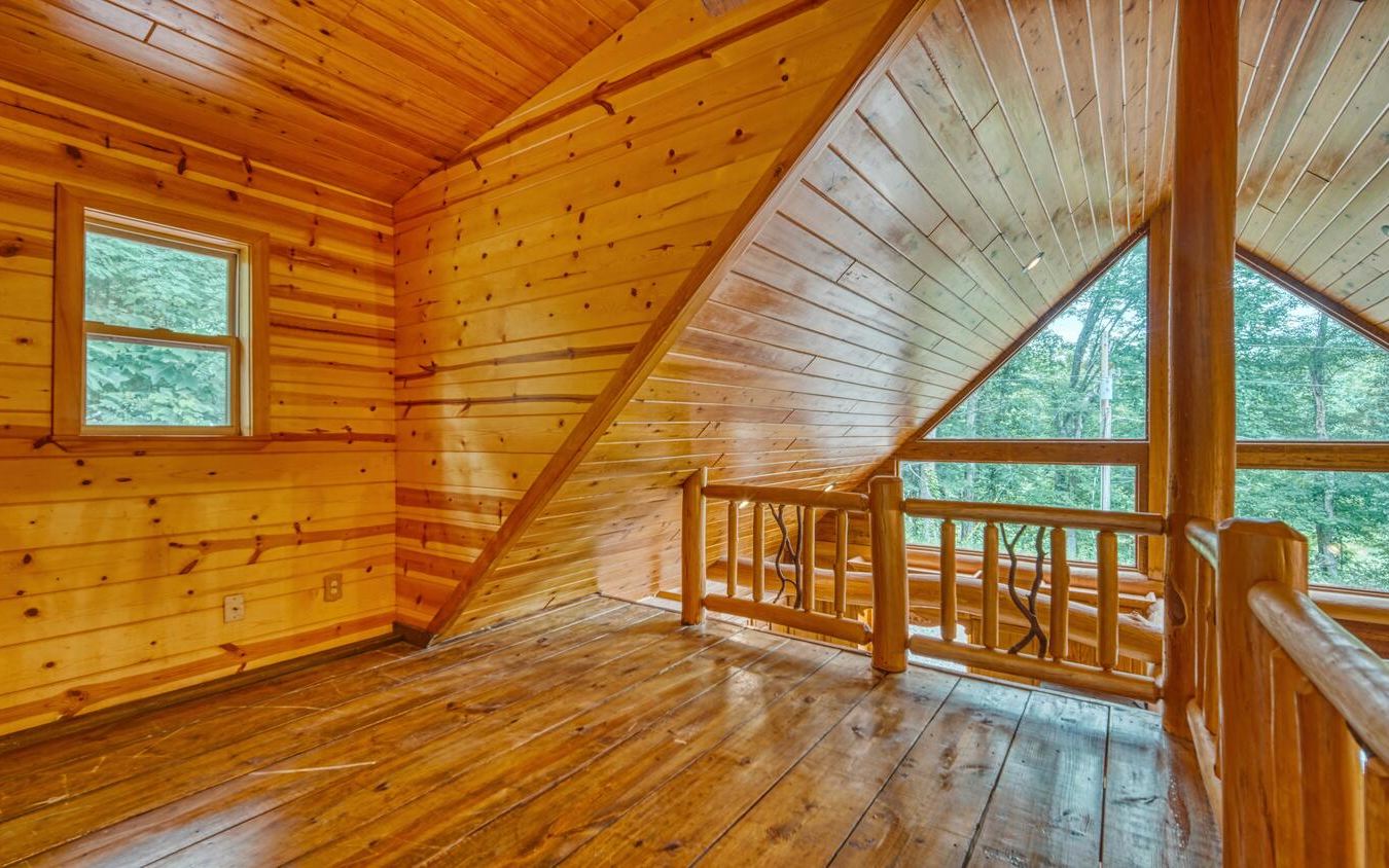 1666 Underwood Road Hiawassee, GA 30546 - Photo 23 of 42 a view of a porch with wooden floor and outdoor space