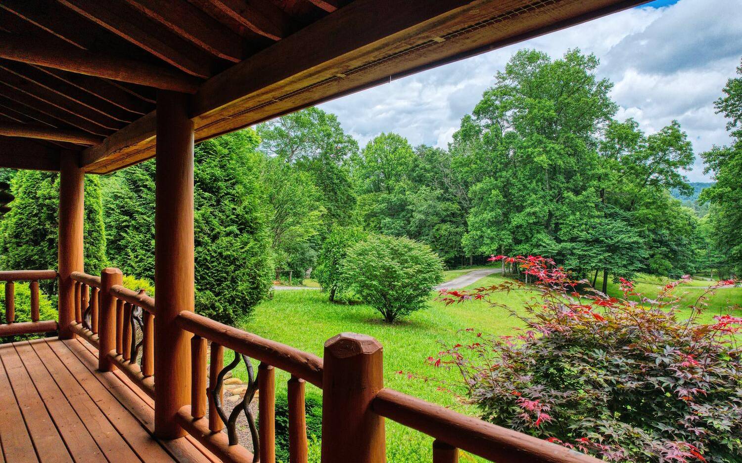 1666 Underwood Road Hiawassee, GA 30546 - Photo 29 of 42 a view of a porch with a yard