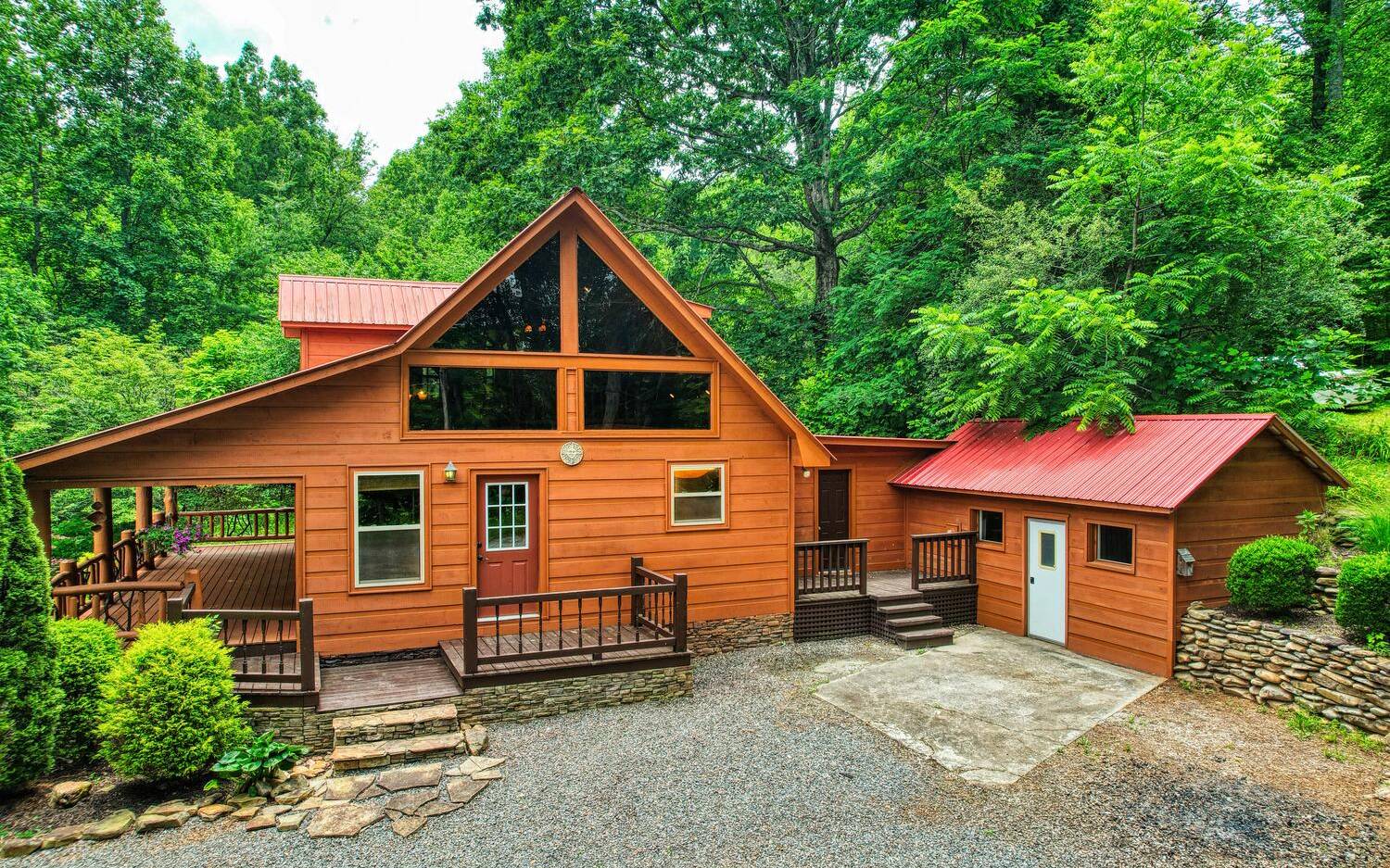 1666 Underwood Road Hiawassee, GA 30546 - Photo 3 of 42 a view of a house with a yard