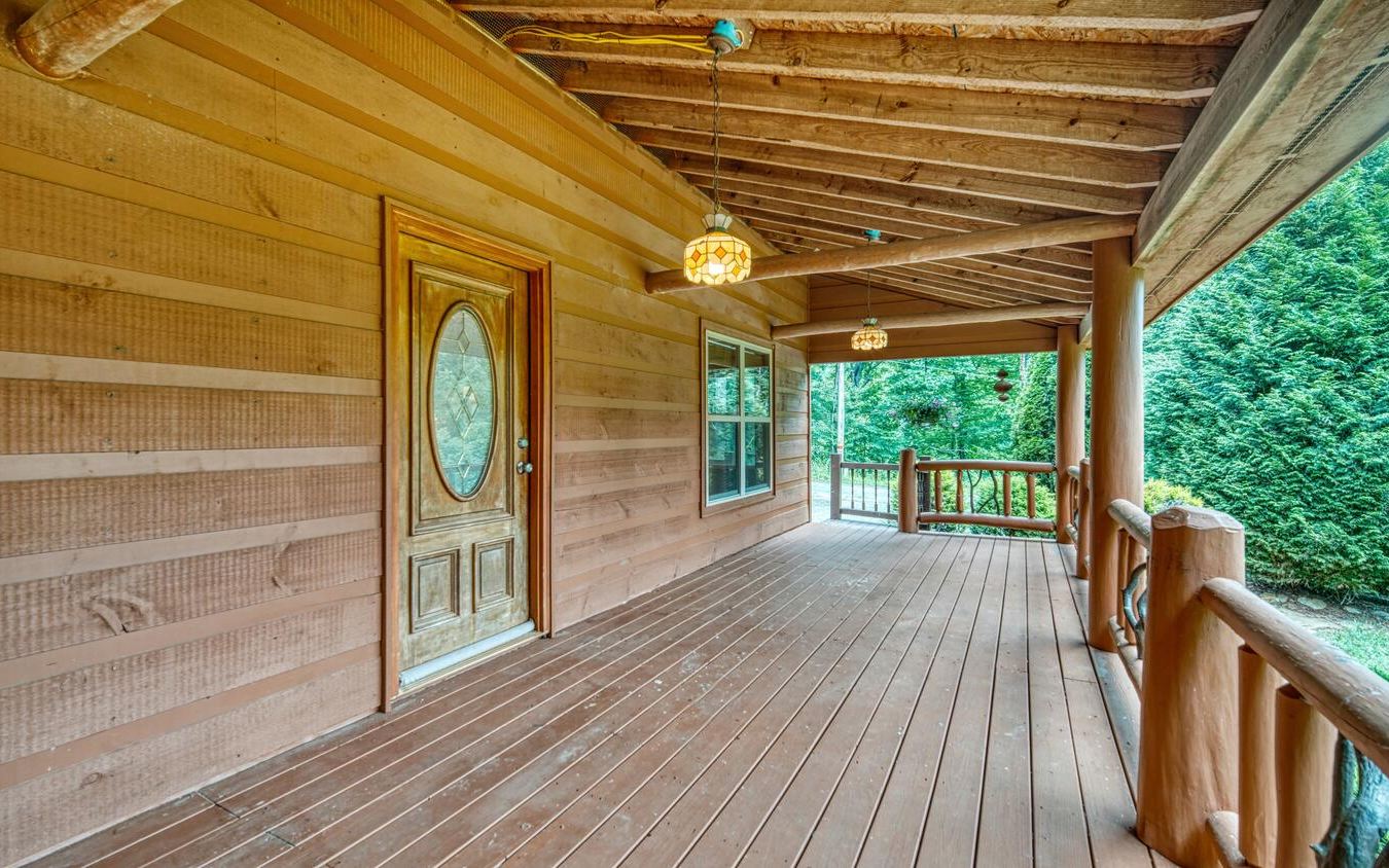 1666 Underwood Road Hiawassee, GA 30546 - Photo 31 of 42 a view of a porch with wooden floor and outdoor space