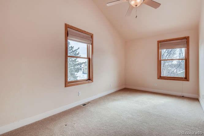 380 County Road Louisville, CO 80027 - Photo 13 of 28 an empty room with a window