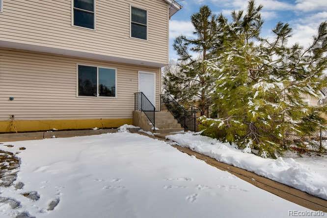 380 County Road Louisville, CO 80027 - Photo 2 of 28 a view of a house with a tree