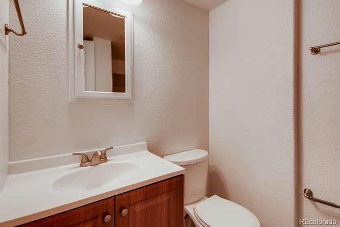 380 County Road Louisville, CO 80027 - Photo 24 of 28 a bathroom with a sink and a toilet