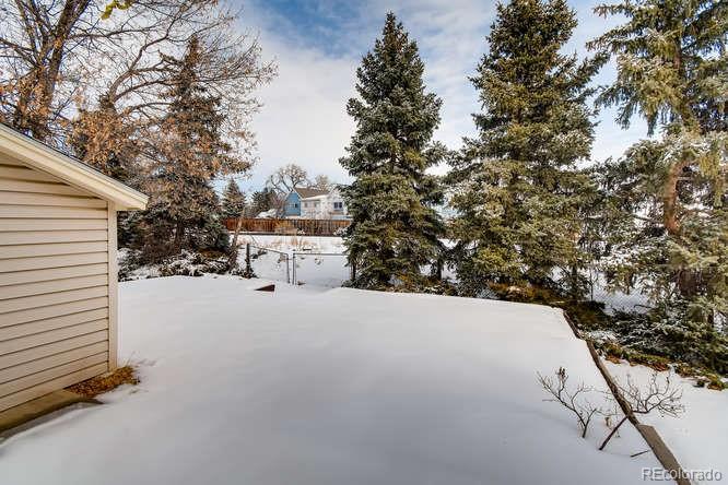 380 County Road Louisville, CO 80027 - Photo 25 of 28 a view of a house with a tree