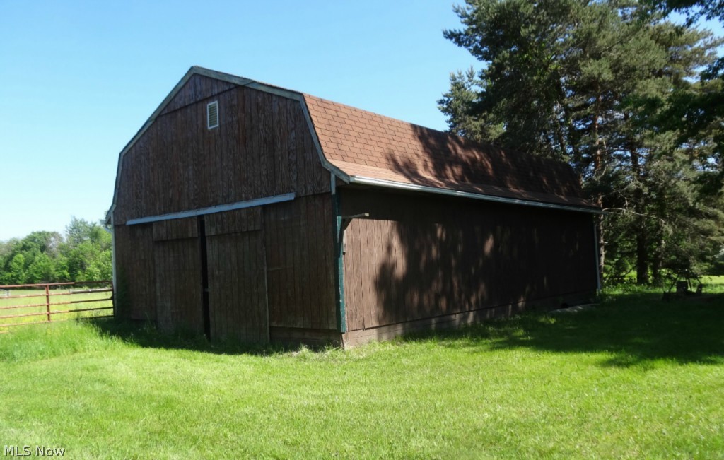 4555 Beat Road Litchfield, OH 44253 - Photo 17 of 20 Nice barn, paddock. There is an outdoor arena, but it is in need of repair.