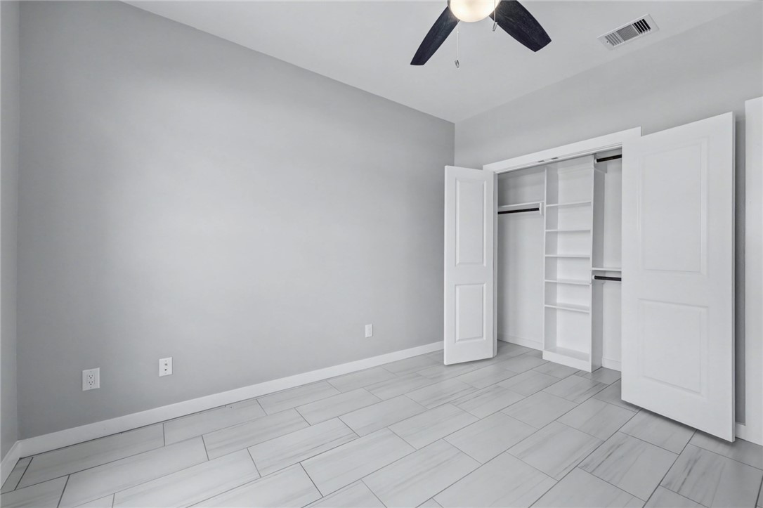 6865 Riesling Street Corpus Christi, TX 78414 - Photo 25 of 32 wooden floor in an empty room