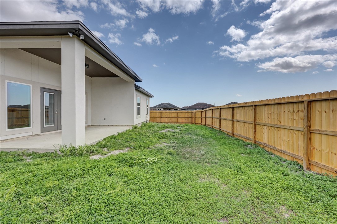 6865 Riesling Street Corpus Christi, TX 78414 - Photo 32 of 32 a view of backyard with pathway