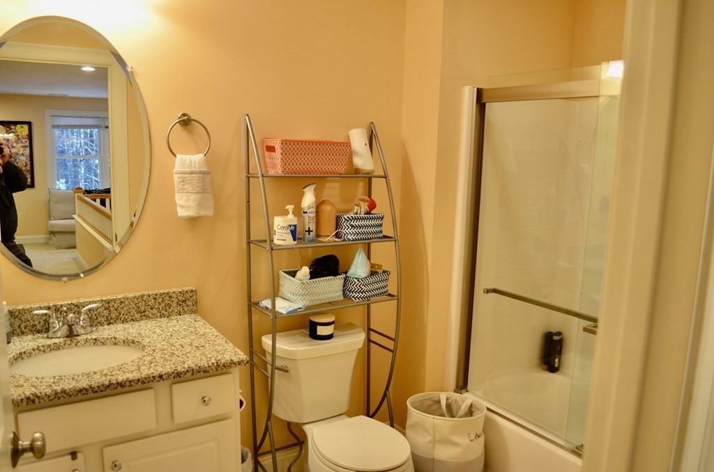 3 Trail Ridge Way, Unit D Harvard, MA 01451 - Photo 21 of 41 a bathroom with a granite countertop sink toilet and shower