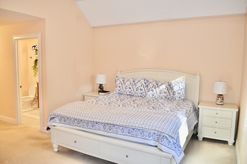 3 Trail Ridge Way, Unit D Harvard, MA 01451 - Photo 23 of 41 a spacious bedroom with a bed and a closet