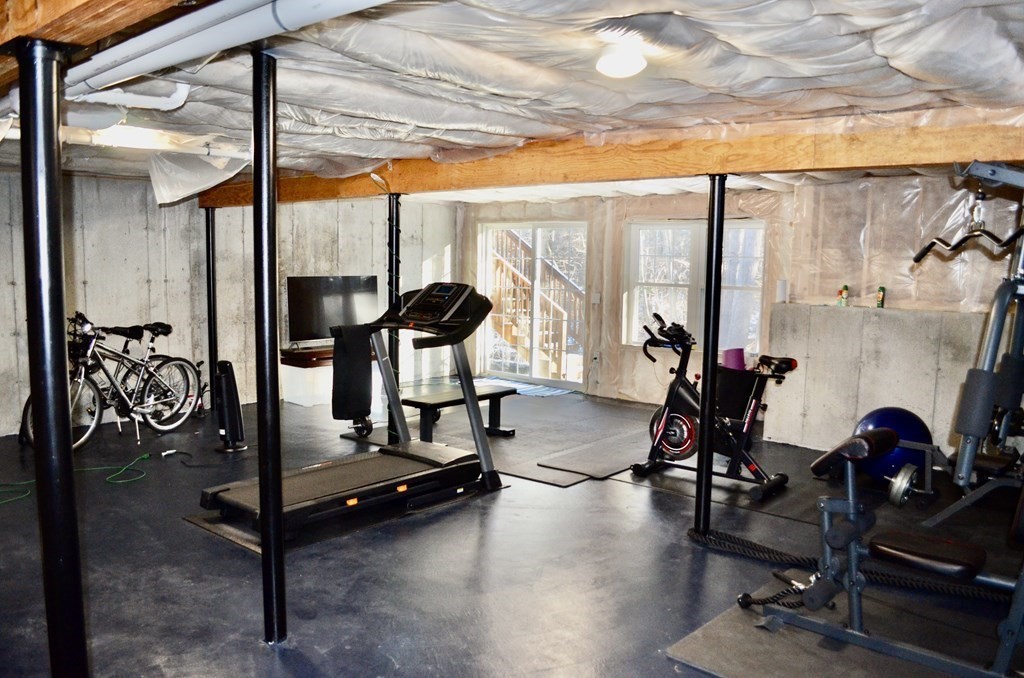 3 Trail Ridge Way, Unit D Harvard, MA 01451 - Photo 28 of 41 a view of a room with gym equipment