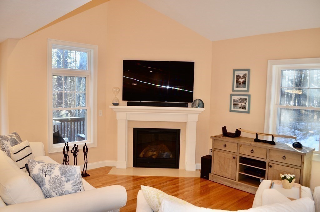 3 Trail Ridge Way, Unit D Harvard, MA 01451 - Photo 3 of 41 a living room with furniture and a fireplace