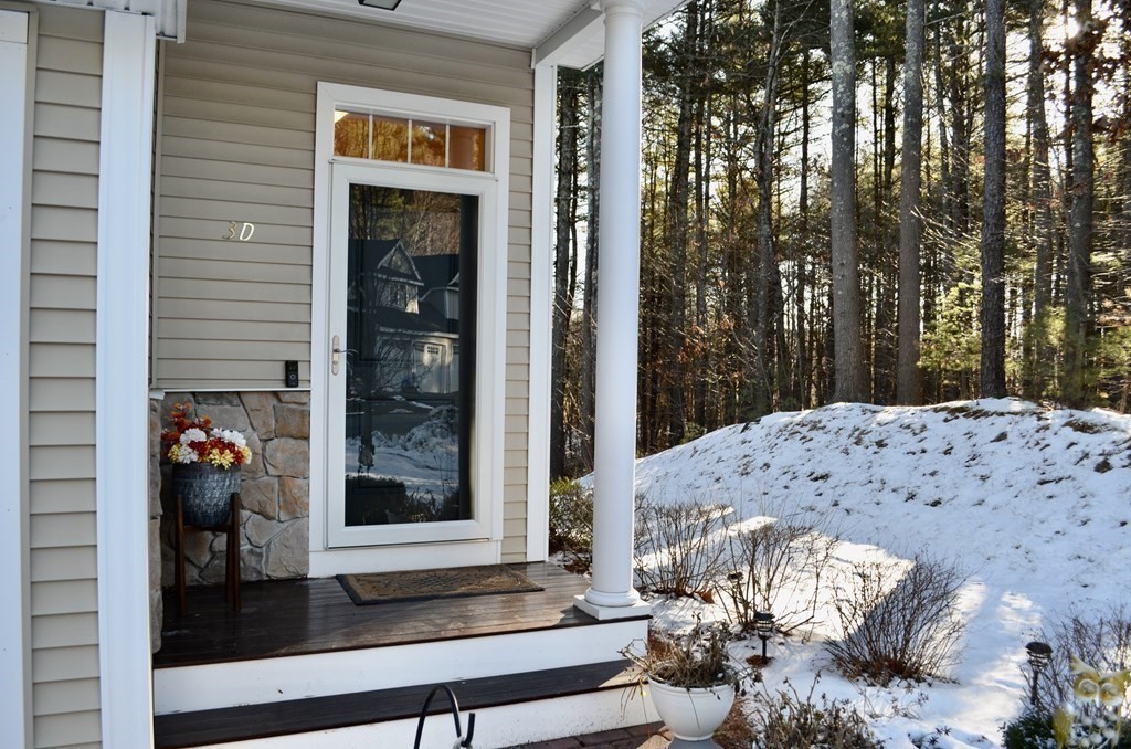 3 Trail Ridge Way, Unit D Harvard, MA 01451 - Photo 34 of 41 a view of a porch with furniture and front door