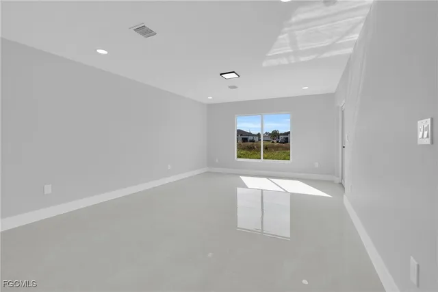 an empty room with windows