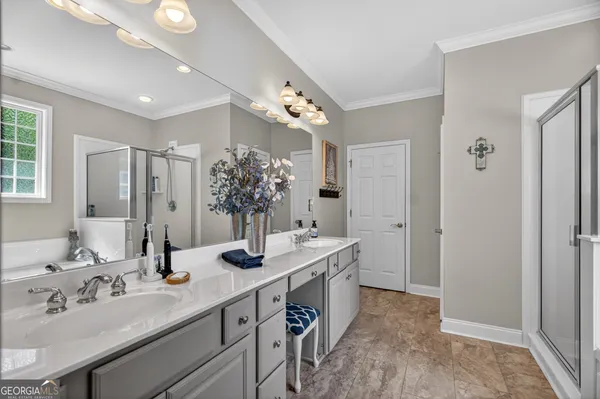 a front view of a house with a yard table and chairs