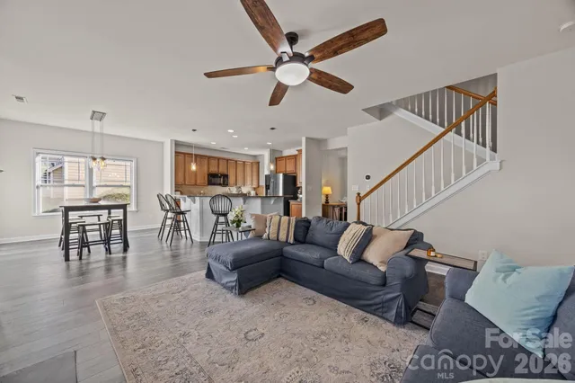 a living room with furniture and a table