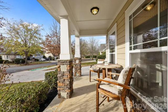 a kitchen with sink and refrigerator