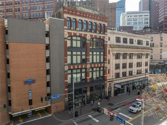 a front view of a building with glass windows