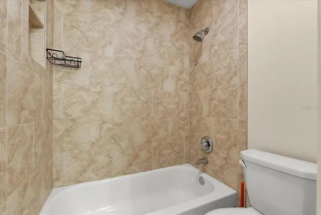 a bathroom with a white bath tub