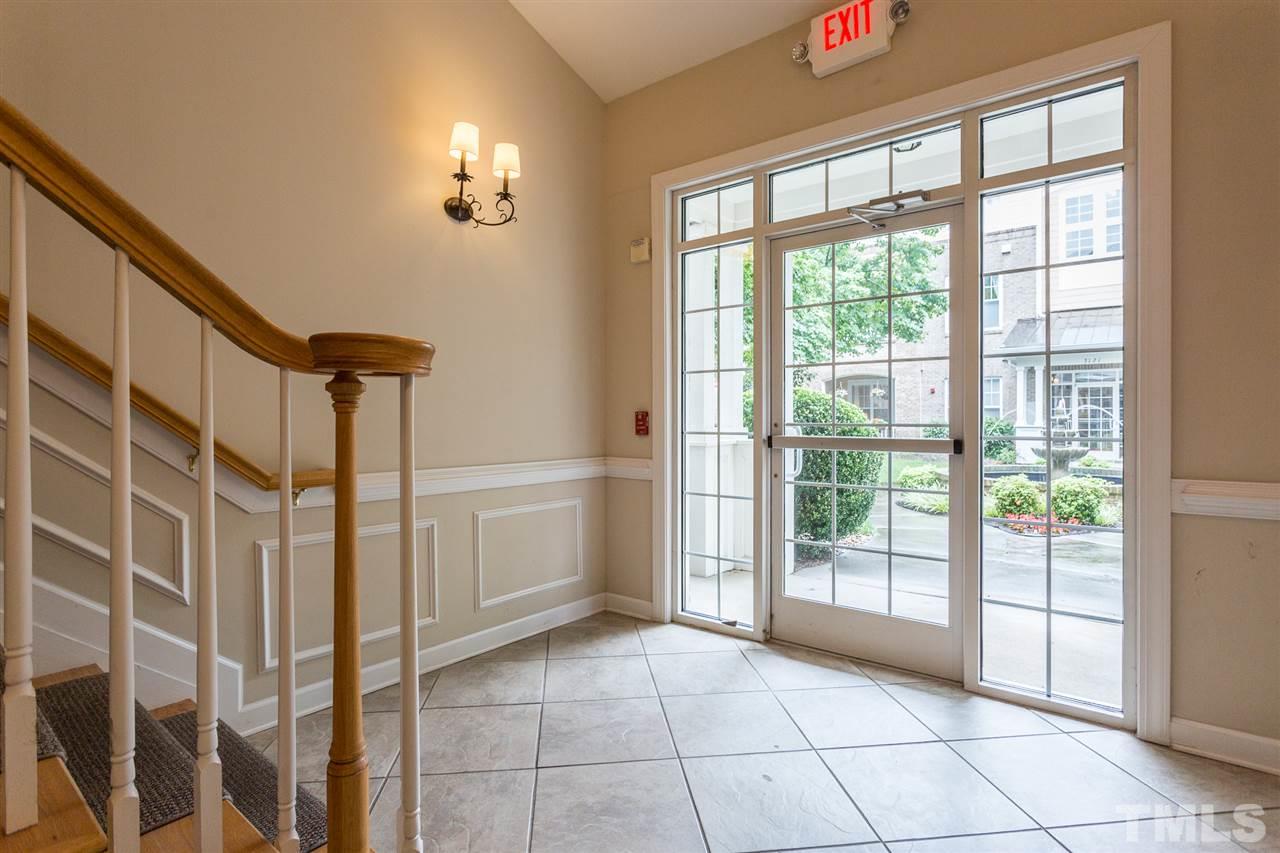 3151 Hemlock Forest Circle, Unit 102 Raleigh, NC 27612 - Photo 6 of 26 a view of an entryway