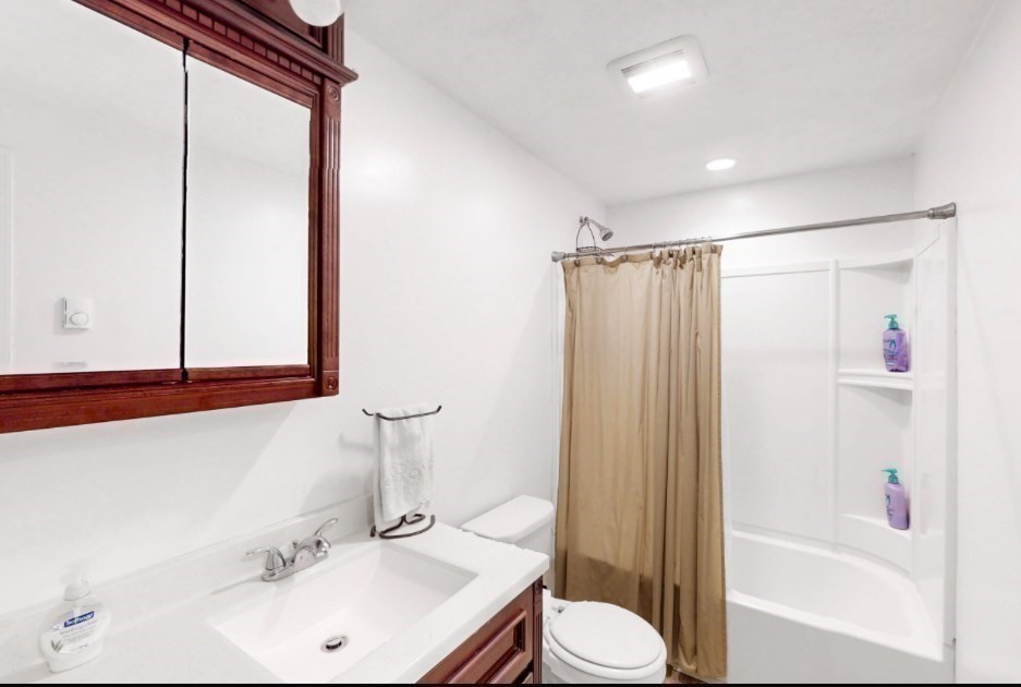 5 B Swan Avenue Worcester, MA 01602 - Photo 12 of 18 a bathroom with a sink toilet and shower