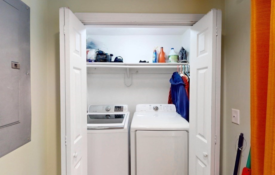 5 B Swan Avenue Worcester, MA 01602 - Photo 14 of 18 a view of storage and utility room with washer and dryer