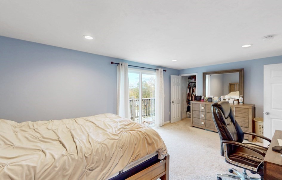 5 B Swan Avenue Worcester, MA 01602 - Photo 6 of 18 a bed sitting in a spacious bedroom next to a window