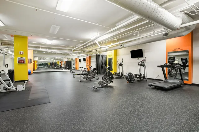 a view of a room with gym equipment