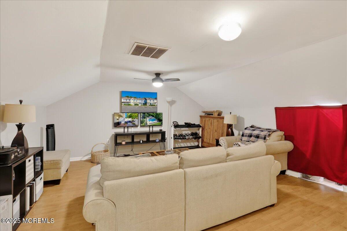 73 Rita Lane Jackson, NJ 08527 - Photo 22 of 32 a living room with furniture and wooden floor