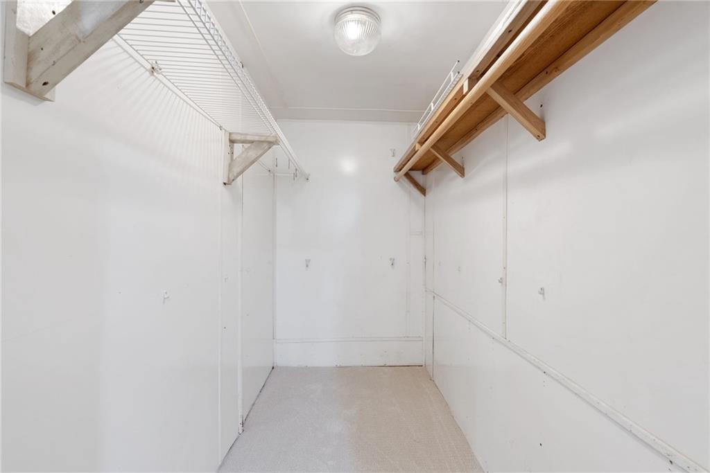 1449 Southland Vista Court Northeast, Unit B Atlanta, GA 30329 - Photo 12 of 26 a view of walk in closet