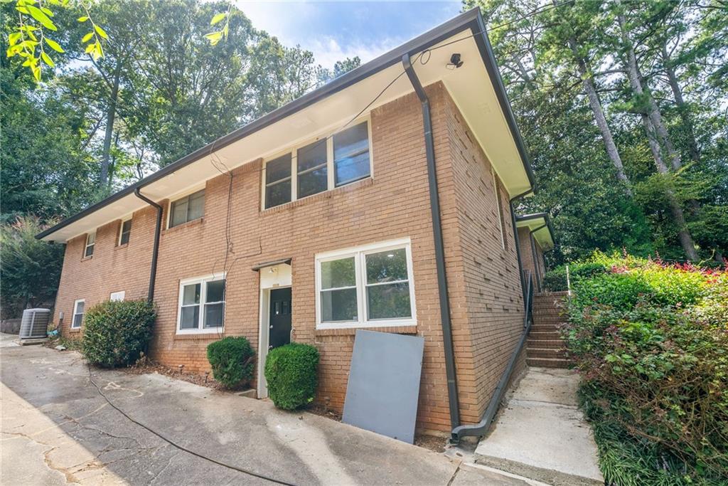 1449 Southland Vista Court Northeast, Unit B Atlanta, GA 30329 - Photo 17 of 26 a view of a house with backyard