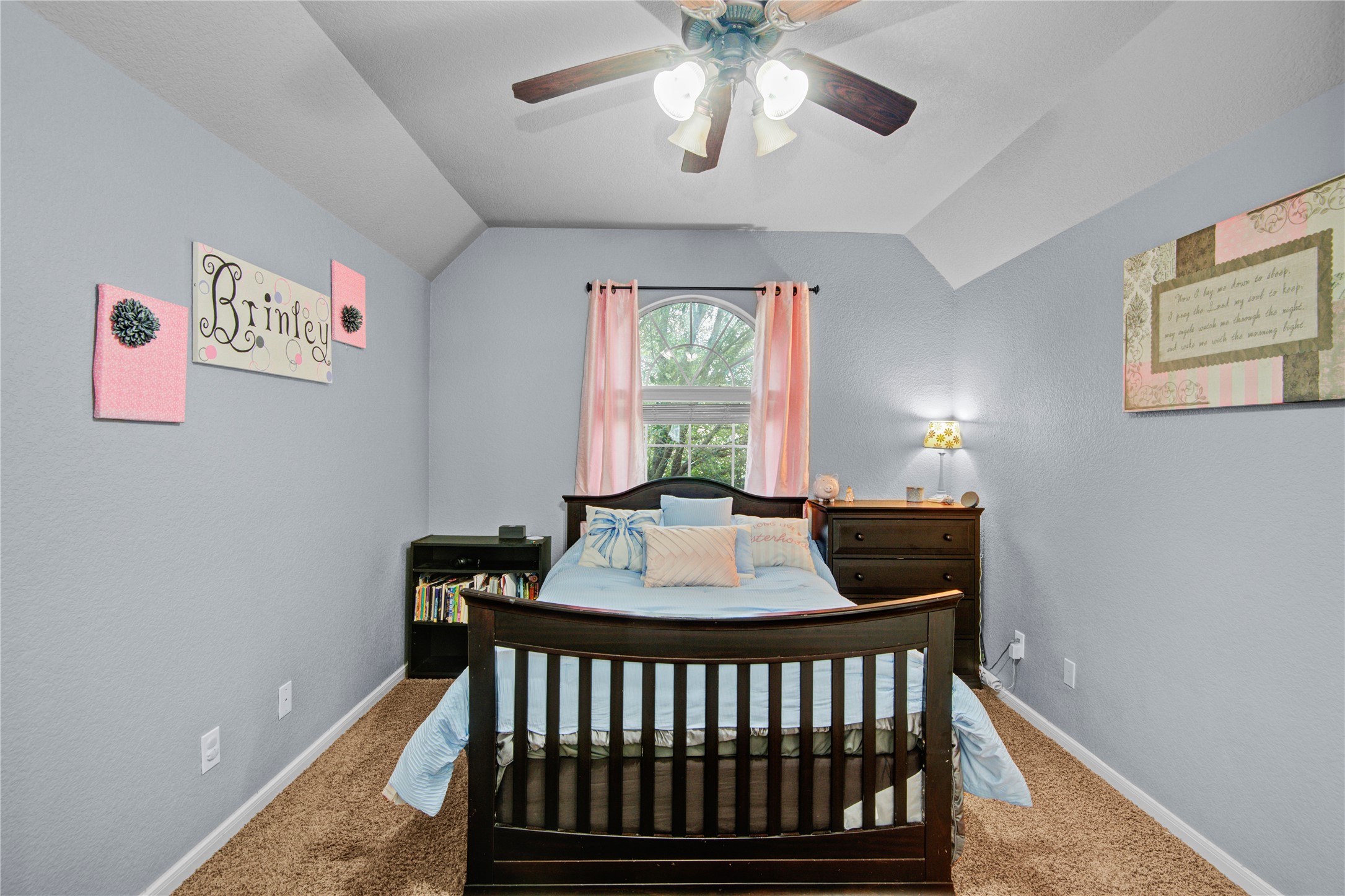 6007 Valhalla Drive Spring, TX 77379 - Photo 27 of 37 The private secondary bedroom near the game room is ideal for guests, older children, or multigenerational living.