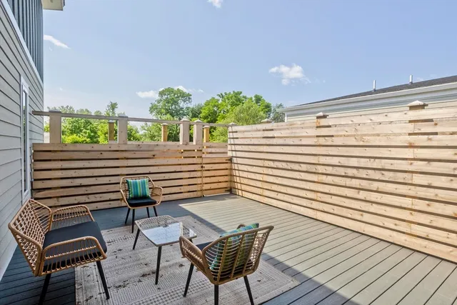 a view of a chairs and table on the wooden floor