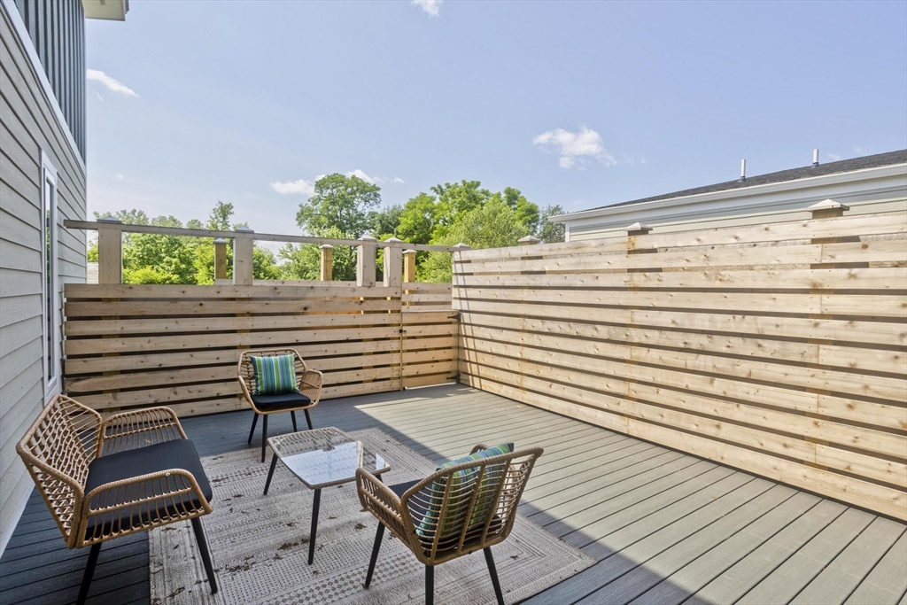 a view of a chairs and table on the wooden floor