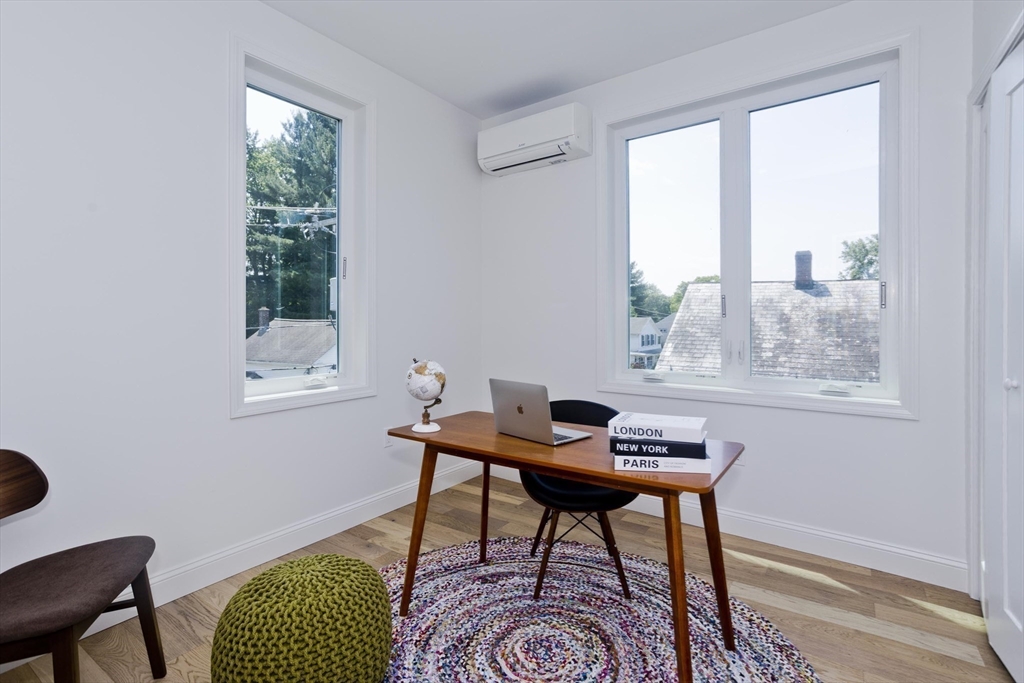 107 Williams Street, Unit 3C Northampton, MA 01060 - Photo 14 of 19 a workspace with furniture and a window