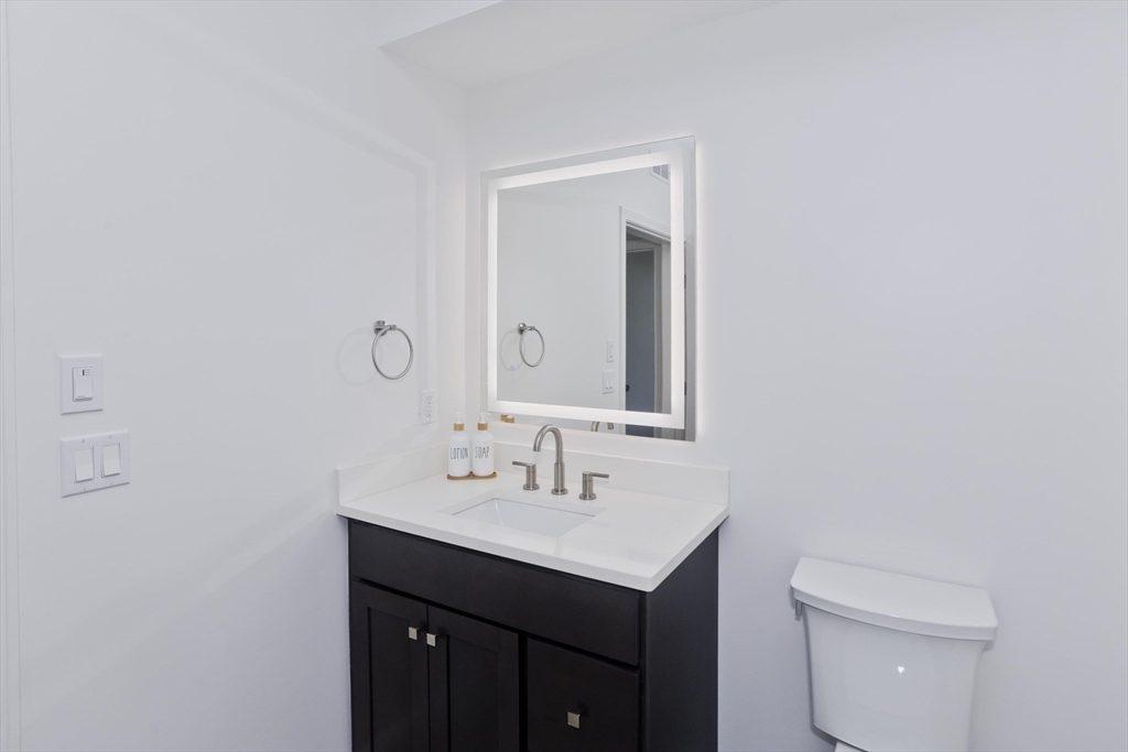 107 Williams Street, Unit 3C Northampton, MA 01060 - Photo 16 of 19 a bathroom with a sink and a toilet