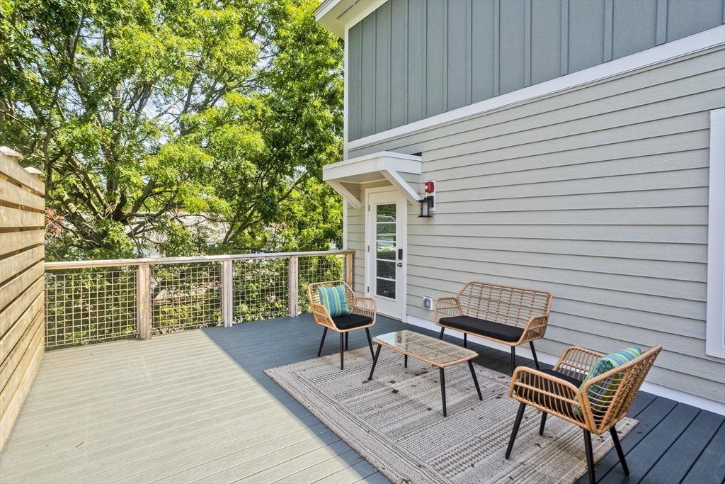 107 Williams Street, Unit 3C Northampton, MA 01060 - Photo 19 of 19 a view of a wooden chairs on the deck
