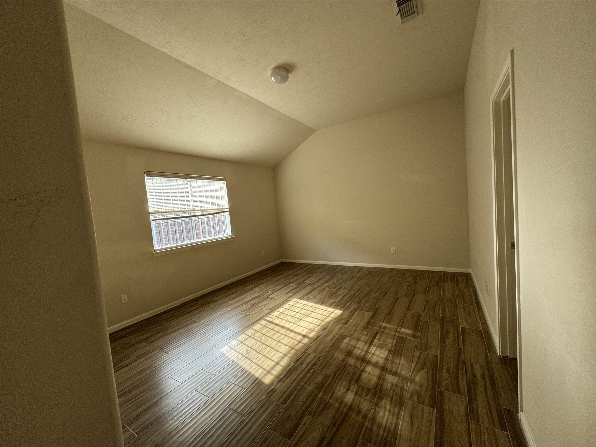 13723 Audra Lane Houston, TX 77083 - Photo 11 of 18 a view of an empty room and window