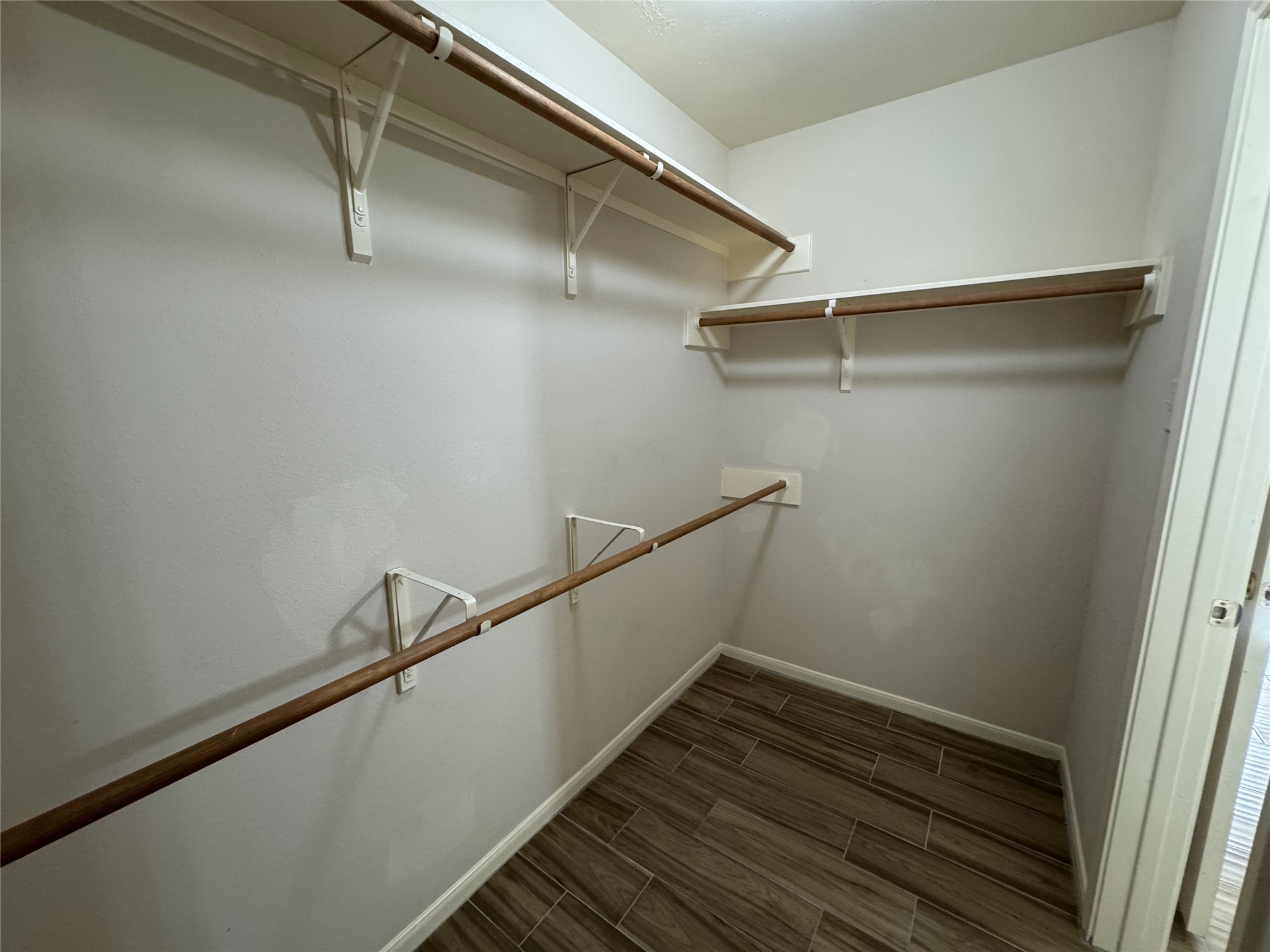 13723 Audra Lane Houston, TX 77083 - Photo 12 of 18 a view of a room with wooden floor